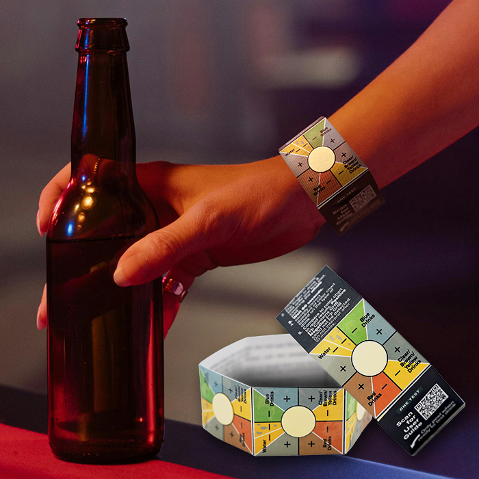 Holding beer wearing wristband