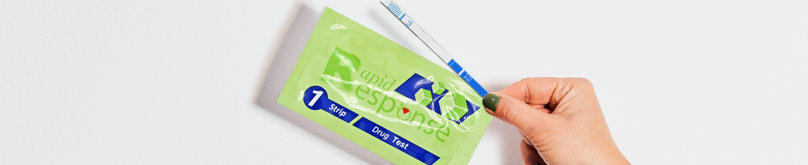 Rapid Response Diagnostics harm reduction test strips - hand holding fentanyl test strip